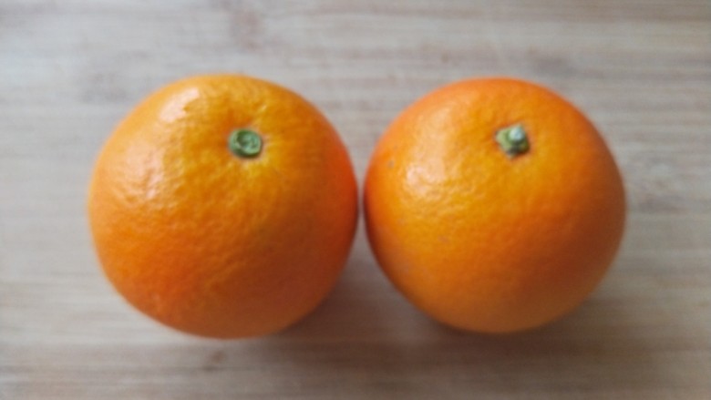 香橙牛奶蒸蛋,挑两个漂亮圆一点的橙子