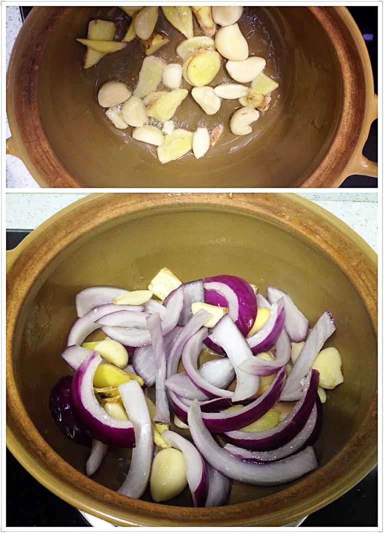 砂锅鱼头,炸鱼头的同时，热好砂锅，倒一点油，爆香姜蒜，再均匀撒入洋葱。