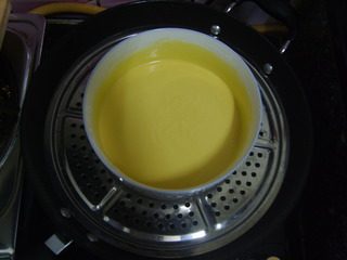 芒果糯米糍,搅拌至无颗粒，然后放锅上大火蒸15分钟，中途搅拌一下，让它更均匀的受热。