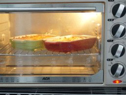 芝士焗龙虾饭 ,烤箱180度预热10分钟，入烤箱烤10分钟即可出炉食用。