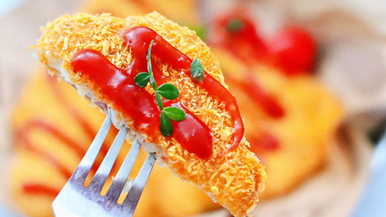 香酥风味鱼排（空气炸锅版）,蘸上番茄酱吃口感更佳。