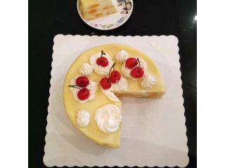 芒果千层蛋糕,这个是买家秀，顾客吃完发来的图片，一看就是谈奶油很好，切出来很整齐