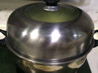 绿豆糕,盖好锅盖，约蒸煮20—25分钟左右。