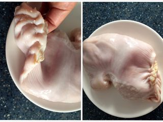 猪肚包鸡,把洗干净的鸡抹上一点点盐，塞进猪肚里面，用牙签封好口。