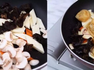 这样做的面筋最好吃！？,热锅起油，同时放入胡萝卜、茭白、白蘑菇、木耳，翻炒出香味，白蘑菇变软后加入油面筋