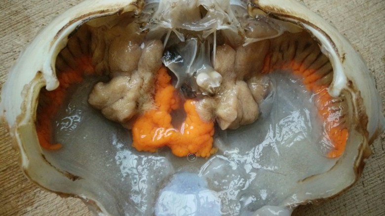 早餐螃蟹海鲜粥,把中间的胃拿掉，还有旁边的清理一下