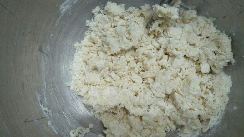 炼奶小馒头(烤箱版),用筷子搅拌成絮状