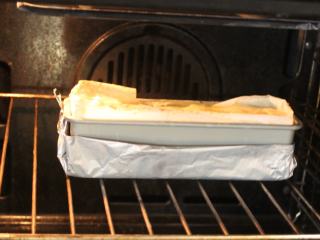 千层土豆,预热好烤箱，以180℃烤50分钟。