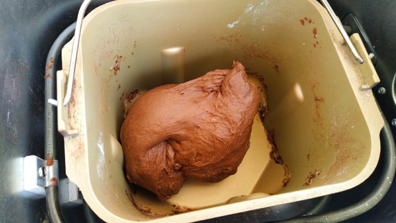 可可麻薯软欧坚果包,再次启动和面程序30分钟，揉出手套膜