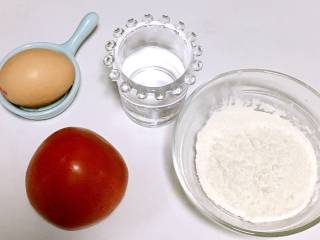 番茄鸡蛋疙瘩汤,食材准备：面粉/30克，清水/45克，鸡蛋/1个，番茄/1个