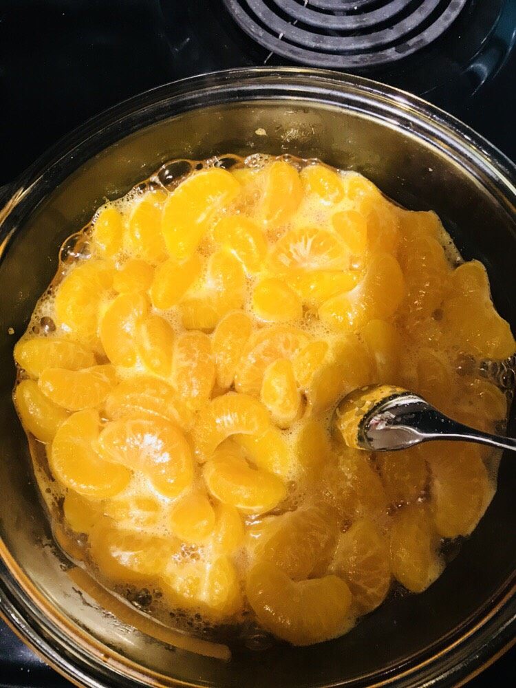 橘子🍊罐头,中火煮沸（边搅拌，去沫），煮沸后关火放置5分钟