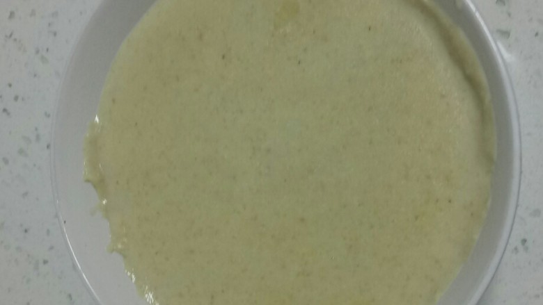 燕麦黄豆小米糊,带发出滴滴的提示音，盛入碗中。