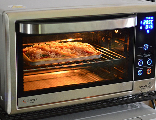 金枪鱼披萨,烤箱预热205度，烤15分钟