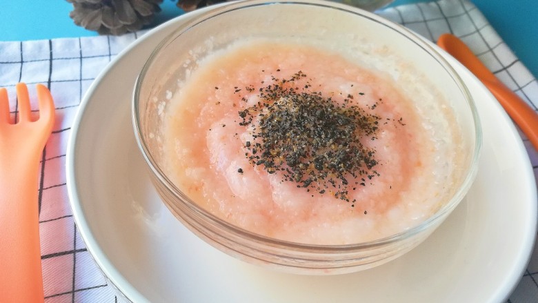 西红柿米粉糊,搅拌均匀后滴入黑芝麻牛油果油和撒入牡蛎粉提味即可