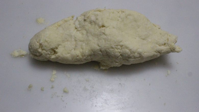 奶油奶酪司康~UKOEO 风炉制作,大概揉匀成团，不要过度揉。酸奶的量不固定，如果太干可以调节，如图这样就差不多了。