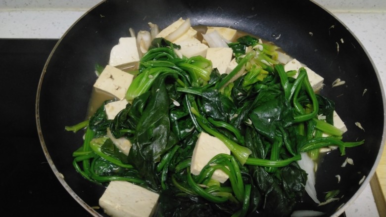 虾米豆腐炒菠菜,搅拌均匀。