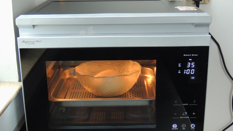 芝麻葱花面包,选择“发酵”模式，设置温度35度，时间1小时。