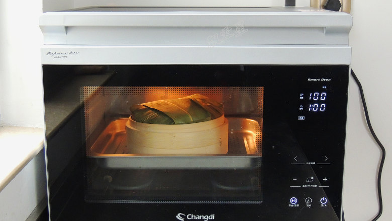糯米排骨饭,蒸烤箱选择“纯蒸”模式，设置温度100度，时间1小时。