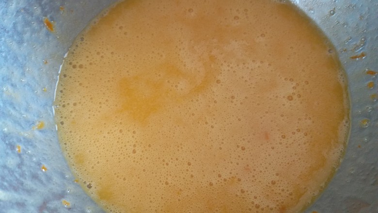 橙香甜甜圈（植物油版）,再次用手动打蛋器搅拌均匀。