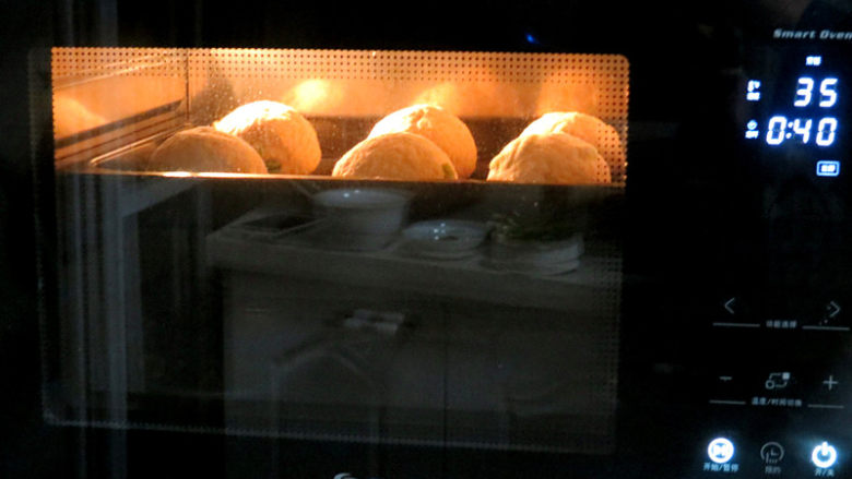 无油无糖，好吃又健康的【黑麦毛豆面包】,继续放烤箱内选择发酵功能进行第二次发酵，35度40分钟