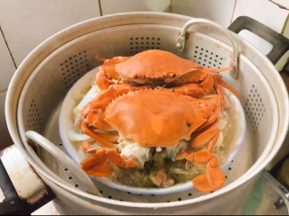清蒸螃蟹,时间上还是要根据蟹的大小，蒸熟了就可以出锅了