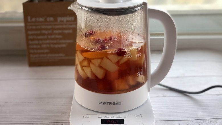 秋梨香橙花果茶,然后启动“花果茶“程序煮10分钟。