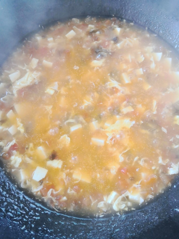 番茄豆腐汤,搅拌均匀出锅