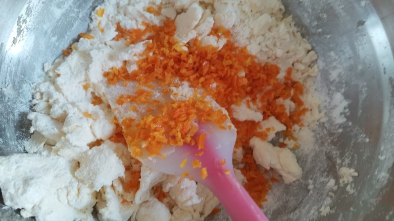 香橙🍊曲奇饼干,用手抓拌均匀，加入橙皮屑