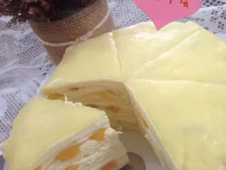 芒果千层蛋糕,定型后切块就比较容易啦！