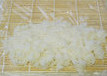 寿司拼盘,寿司帘铺一张保鲜膜，将米饭铺在保鲜膜上，摊匀