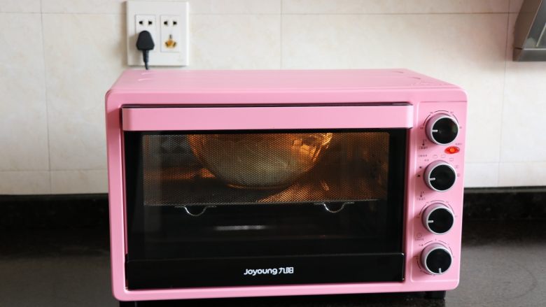 迷迭香佛卡夏,放进烤箱，选择发酵功能发酵1小时；