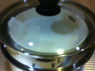 米浆糕,改中火蒸15分钟，再改大火蒸8分钟，关火，焖5分钟再出锅