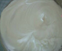 咖啡奶酪戚风蛋糕 ,蛋白用电动打蛋器打至硬性发泡，成为蛋白霜