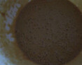 咖啡奶酪戚风蛋糕 ,加入2包咖啡粉和过筛的低筋面粉拌匀，成为蛋黄糊