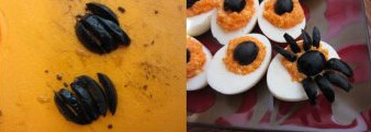 黑蜘蛛鱼子酱塞蛋,另外取一个黑橄榄剖开切成细条，每边四条插入蛋黄泥当蜘蛛腿