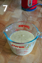 原味鸡蛋仔 ,将蛋糊倒入一个带”嘴“的容器或杯子里，盖上湿布或保鲜膜，静置20分钟