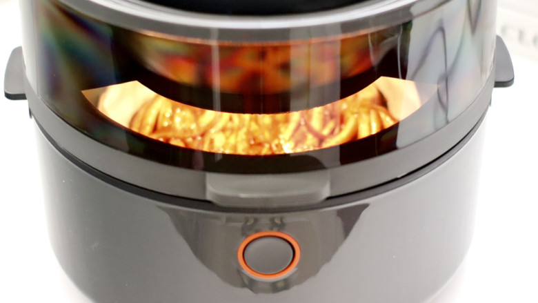 烤鱿鱼头（空气炸锅版）,200度烤10分钟后，取出翻面再烤10分钟即可。